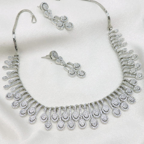Silver-toned CZ drop necklace set with matching earrings by joyrias