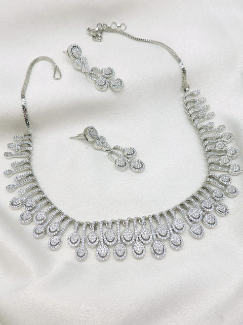 Silver-toned CZ drop necklace set with matching earrings by joyrias