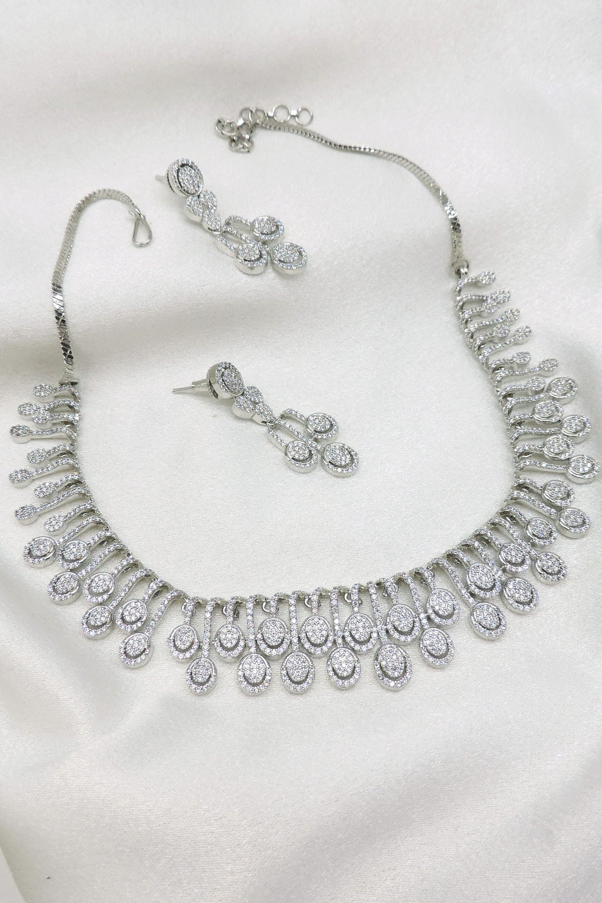 Silver-toned CZ drop necklace set with matching earrings by joyrias