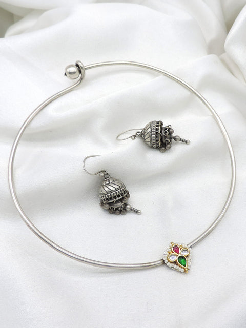 Oxidized silver Hasli heart pendant choker set with matching jhumka earrings by joyrias