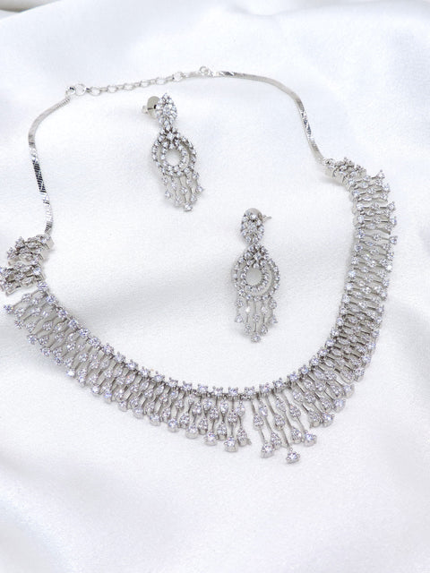 Silver CZ layered necklace set with matching dangling earrings by joyrias