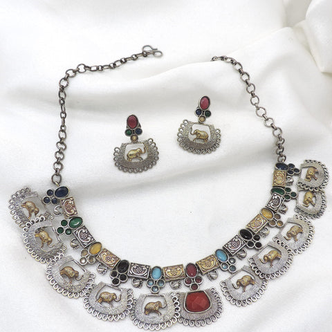 Oxidized dual-tone elephant multicolor choker set with colorful stones and matching earrings by joyrias