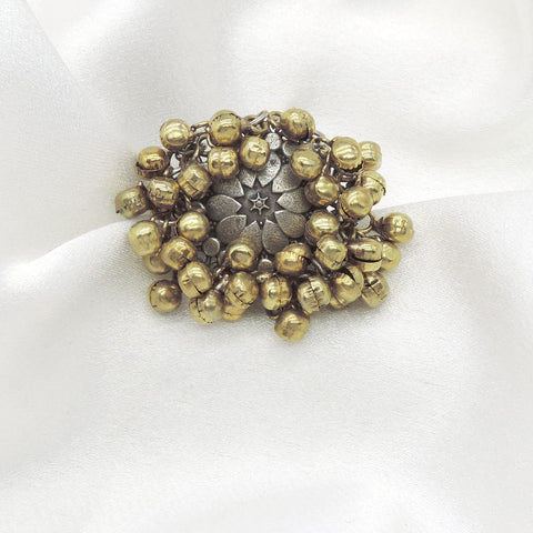 Oxidised antique floral ring with layered bead detailing from joyrias