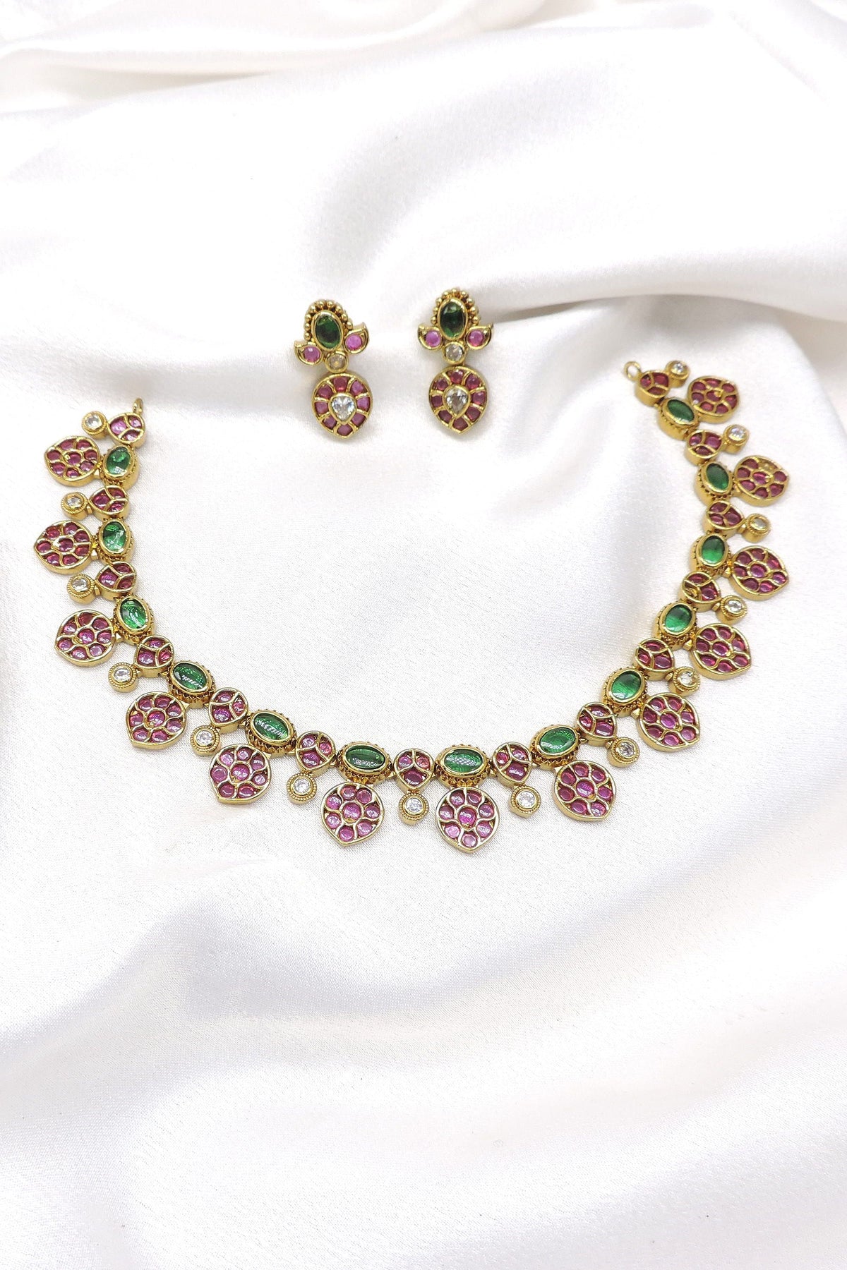 Pink green stone necklace set with matching earrings by Joyrias