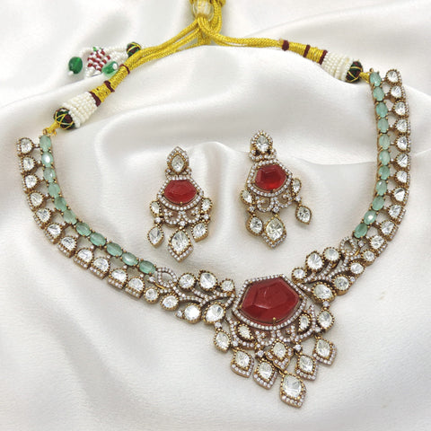 Ruby and mint Kundan necklace set by Joyrias