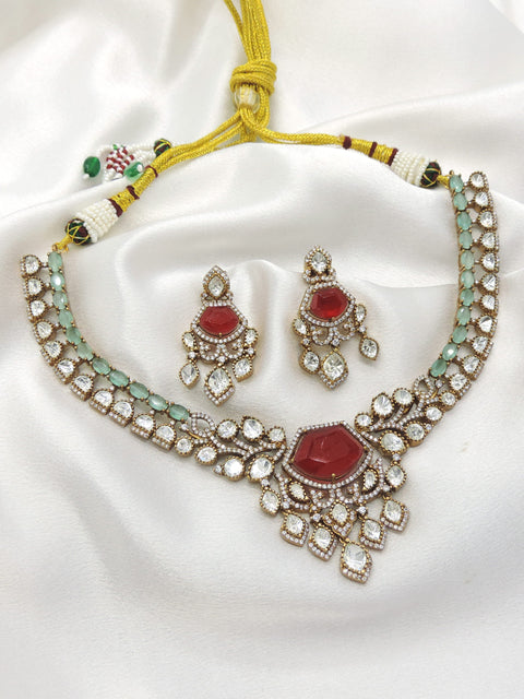 Ruby and mint Kundan necklace set by Joyrias