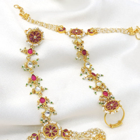 Maroon pearl kundan hathphool with floral detailing and hand chain from joyrias