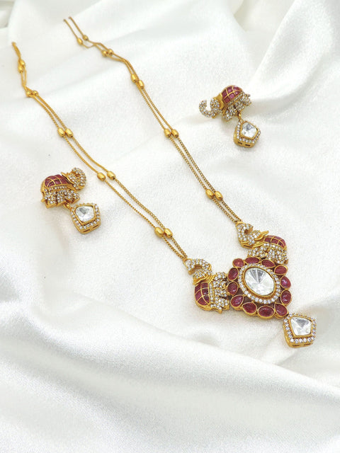 Majestic elephant motif necklace set with red and clear stones and matching earrings