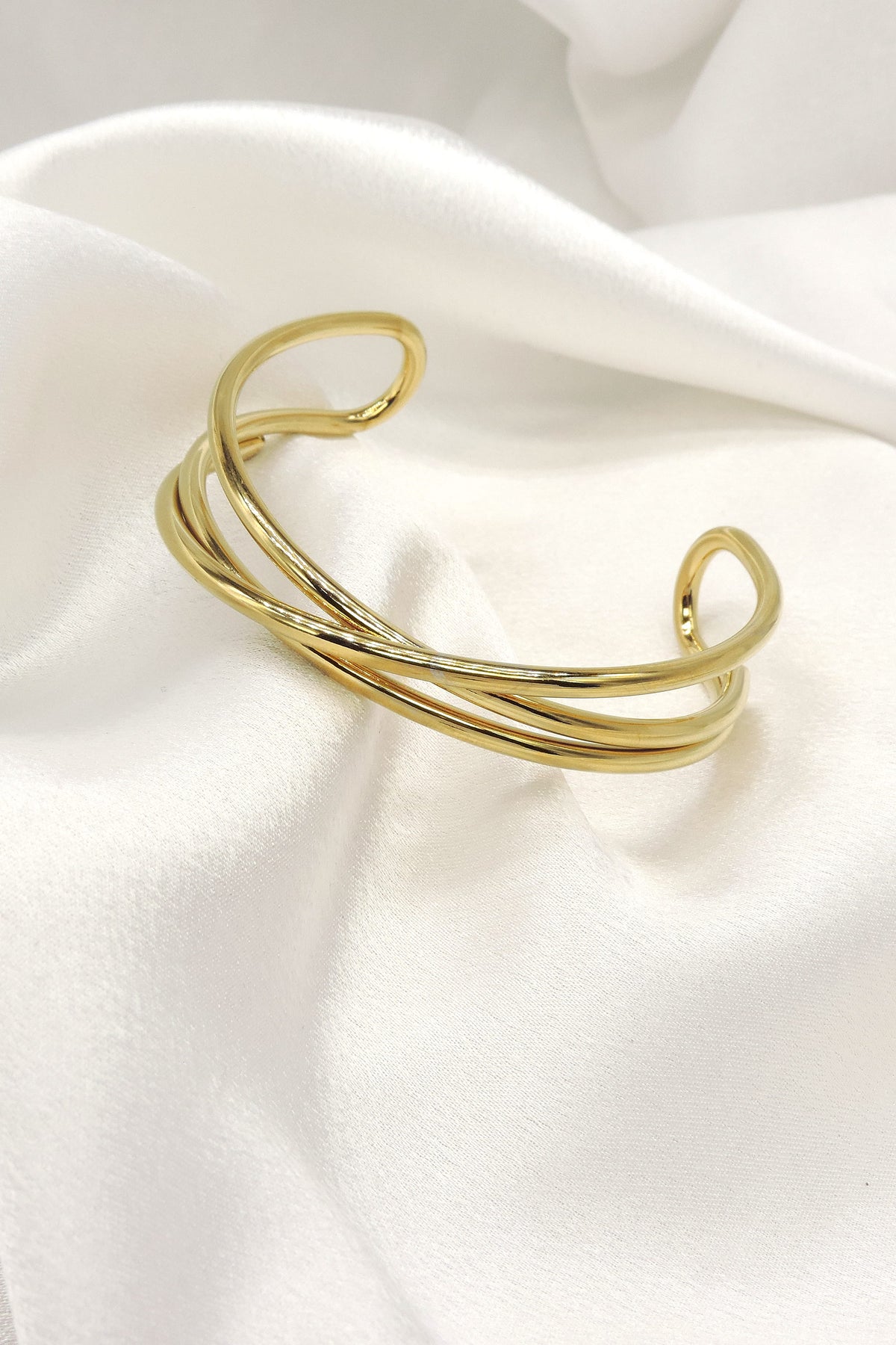 Cross Wire Gold Cuff Bracelet by Joyrias