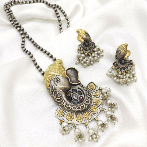 Ganesha motif imitation necklace set with accent stones, pearl clusters, CZ accents, and matching earrings