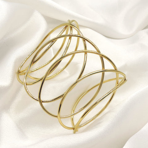 Abstract Wave Gold Cuff Bracelet by Joyrias