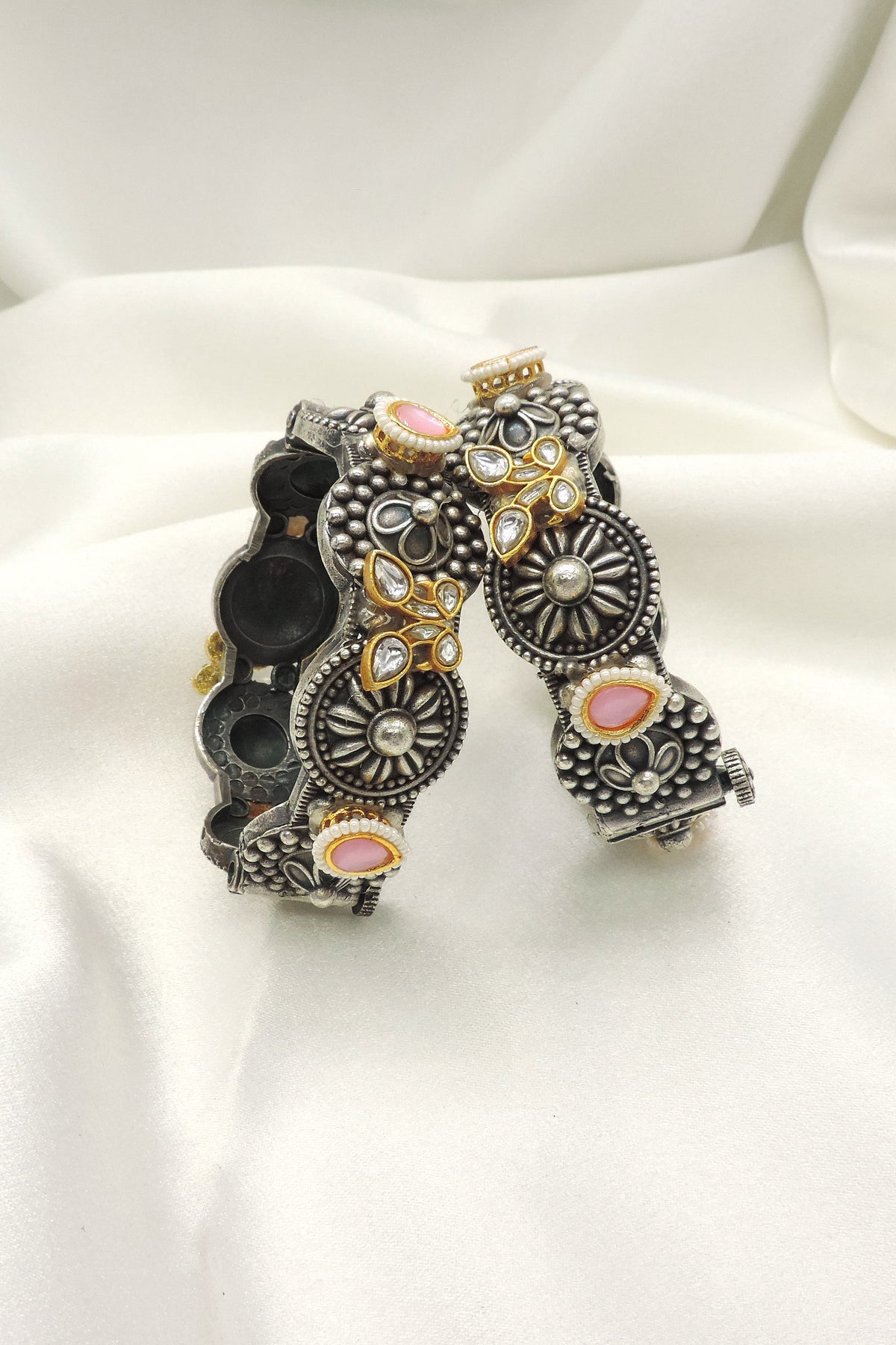 Oxidised pink kundan bangle set with floral detailing