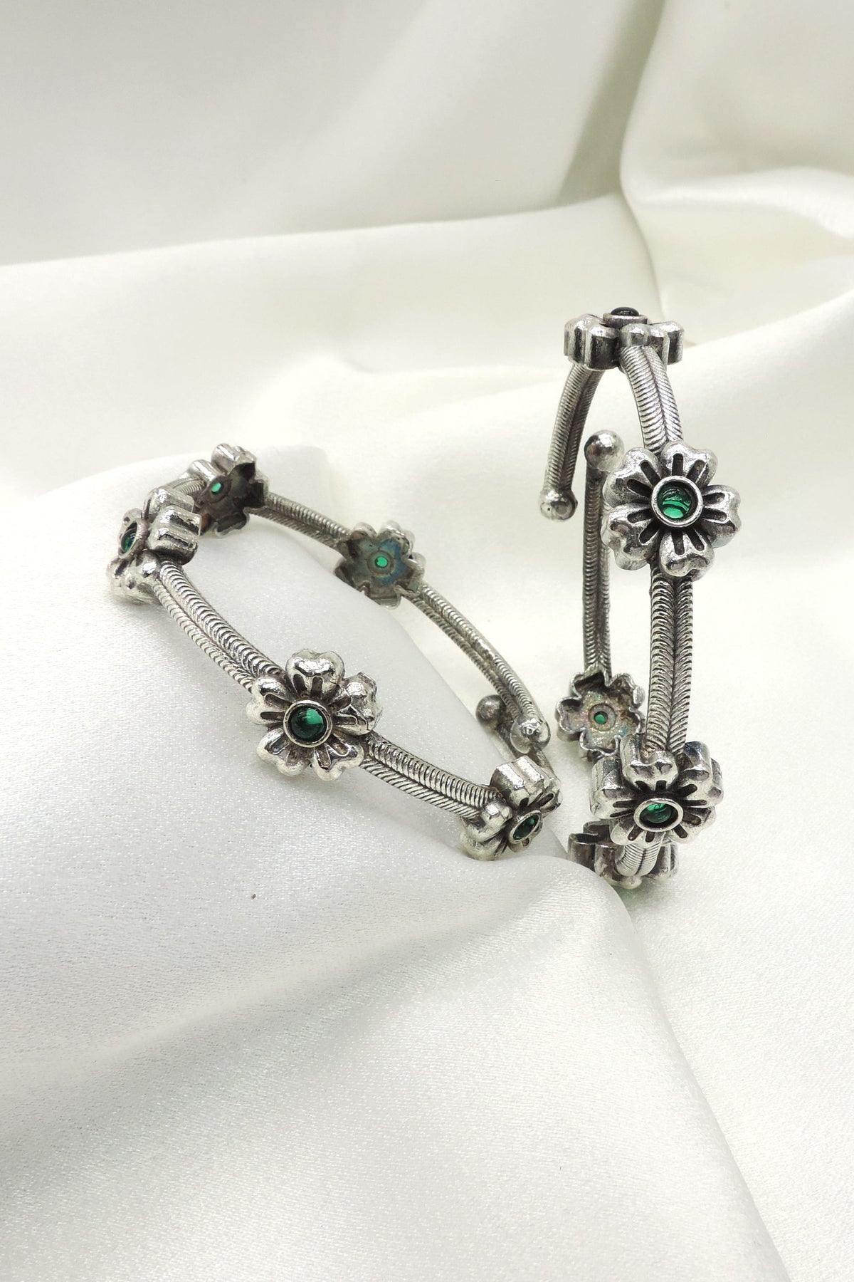 Oxidized floral bangle set by Joyrias