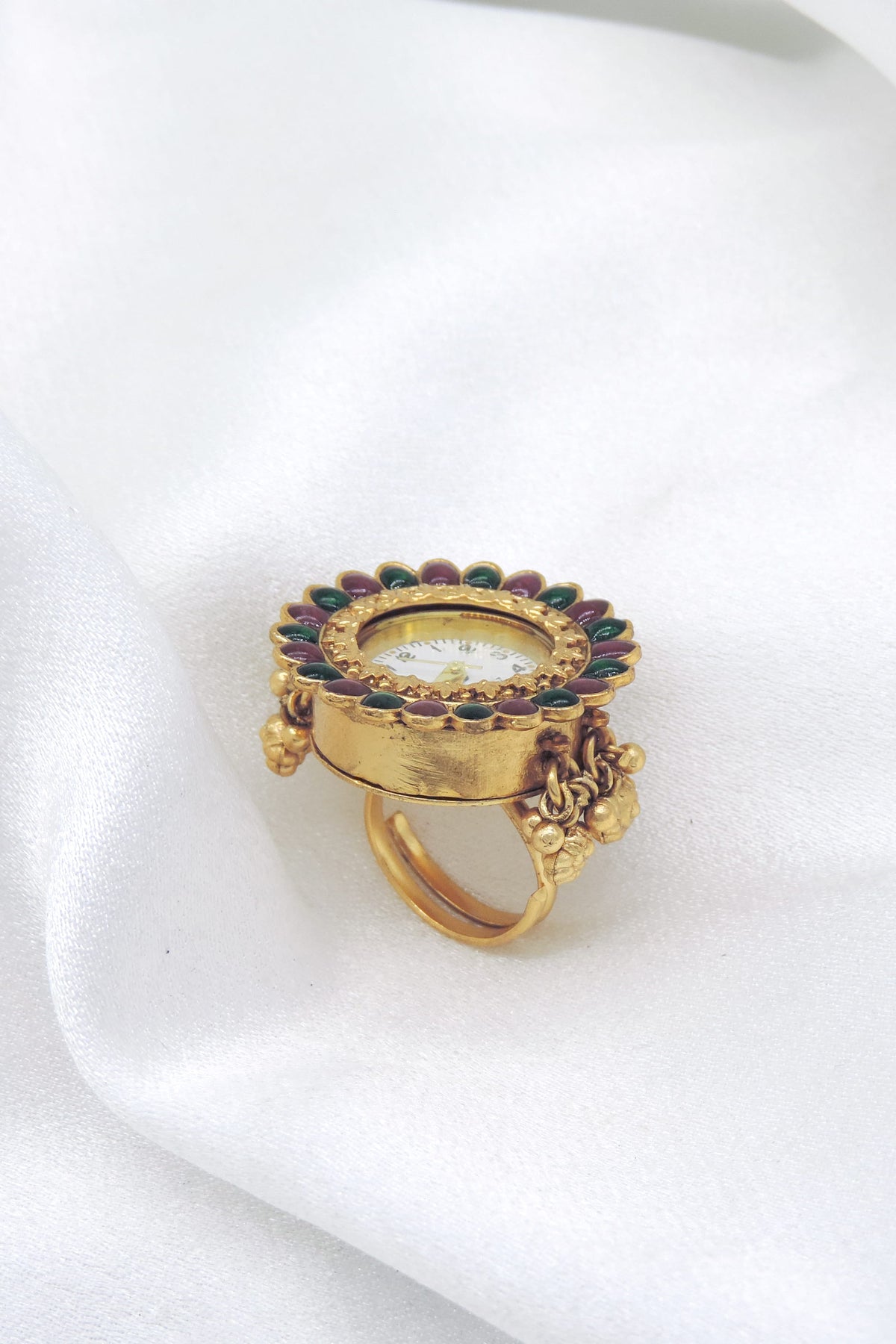 Gold-toned multicolor kundan floral ring with traditional detailing by joyrias
