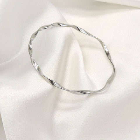 Twisted Silver Bangle Bracelet by Joyrias