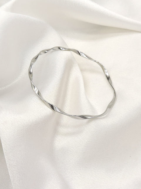 Twisted Silver Bangle Bracelet by Joyrias