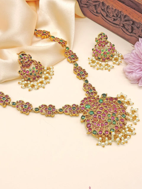 Floral ruby and emerald necklace set with jhumkas – Indian bridal jewelry USA – Joyrias