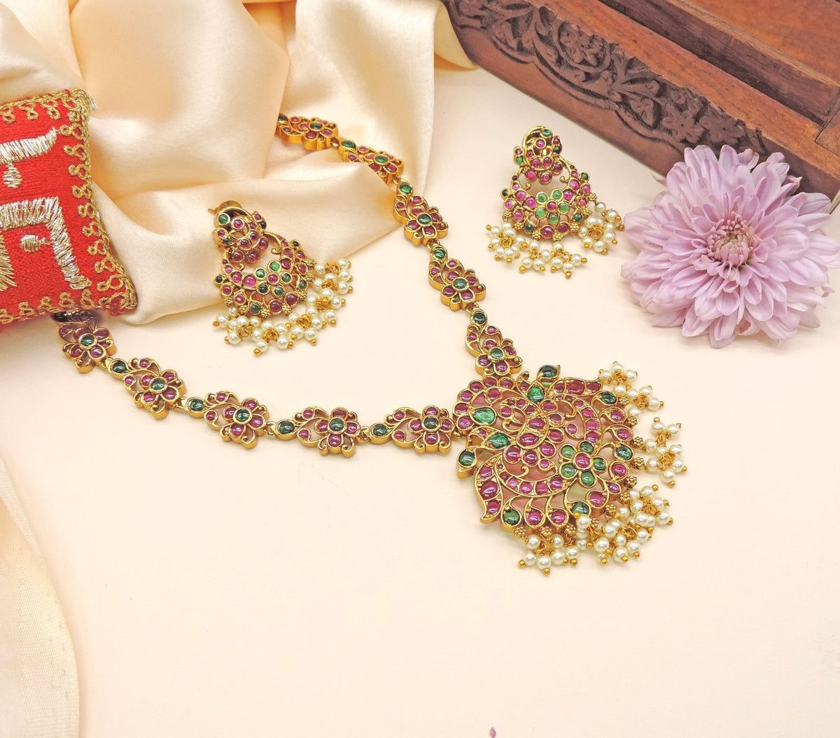 Floral ruby and emerald necklace set with jhumkas – Indian bridal jewelry USA – Joyrias