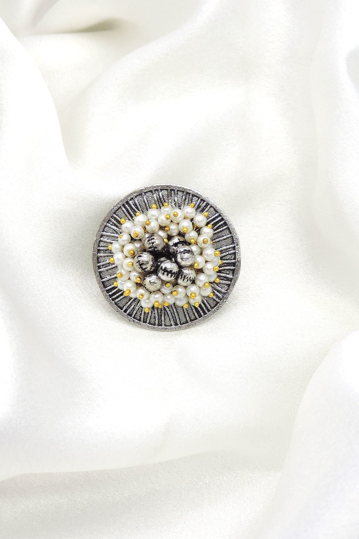 Oxidised pearl beaded ring with clustered silver detailing from joyrias