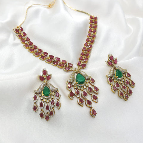 Ruby & Green Kundan Necklace Set by Joyrias