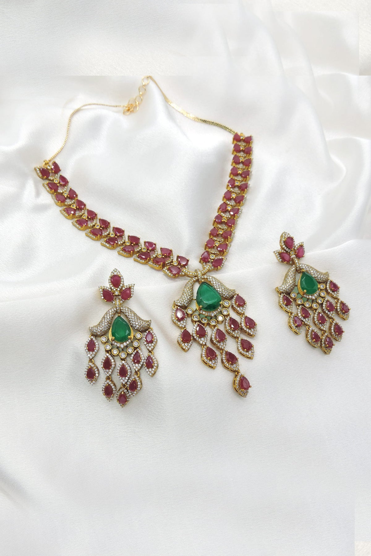 Ruby & Green Kundan Necklace Set by Joyrias