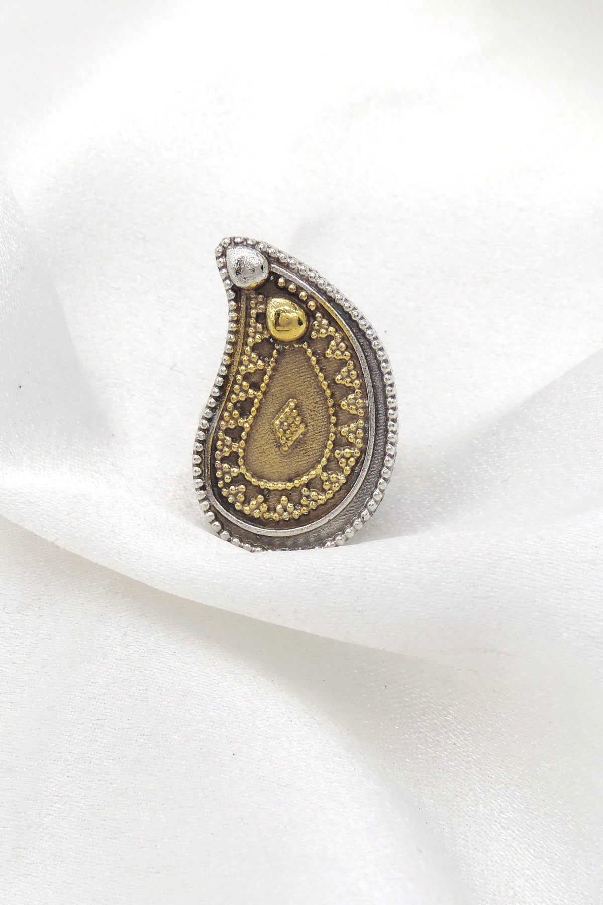 Oxidized gold-toned paisley motif traditional ring by joyrias