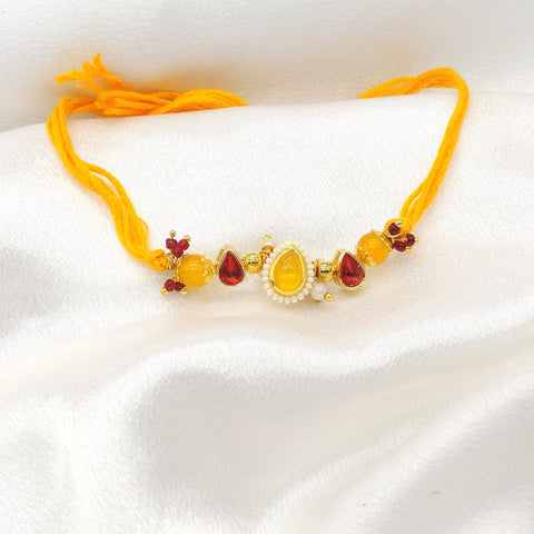 Amber teardrop pearl bhaiya rakhi by Joyrias