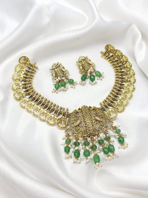 Temple coin pearl green bead necklace set with matching earrings by joyrias