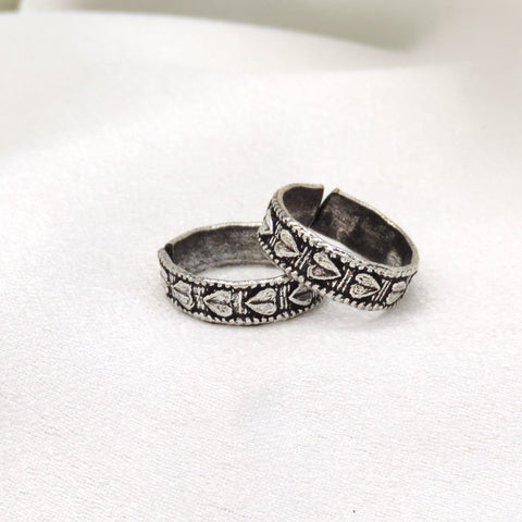 Oxidized silver patterned floral band ring with traditional detailing by joyrias