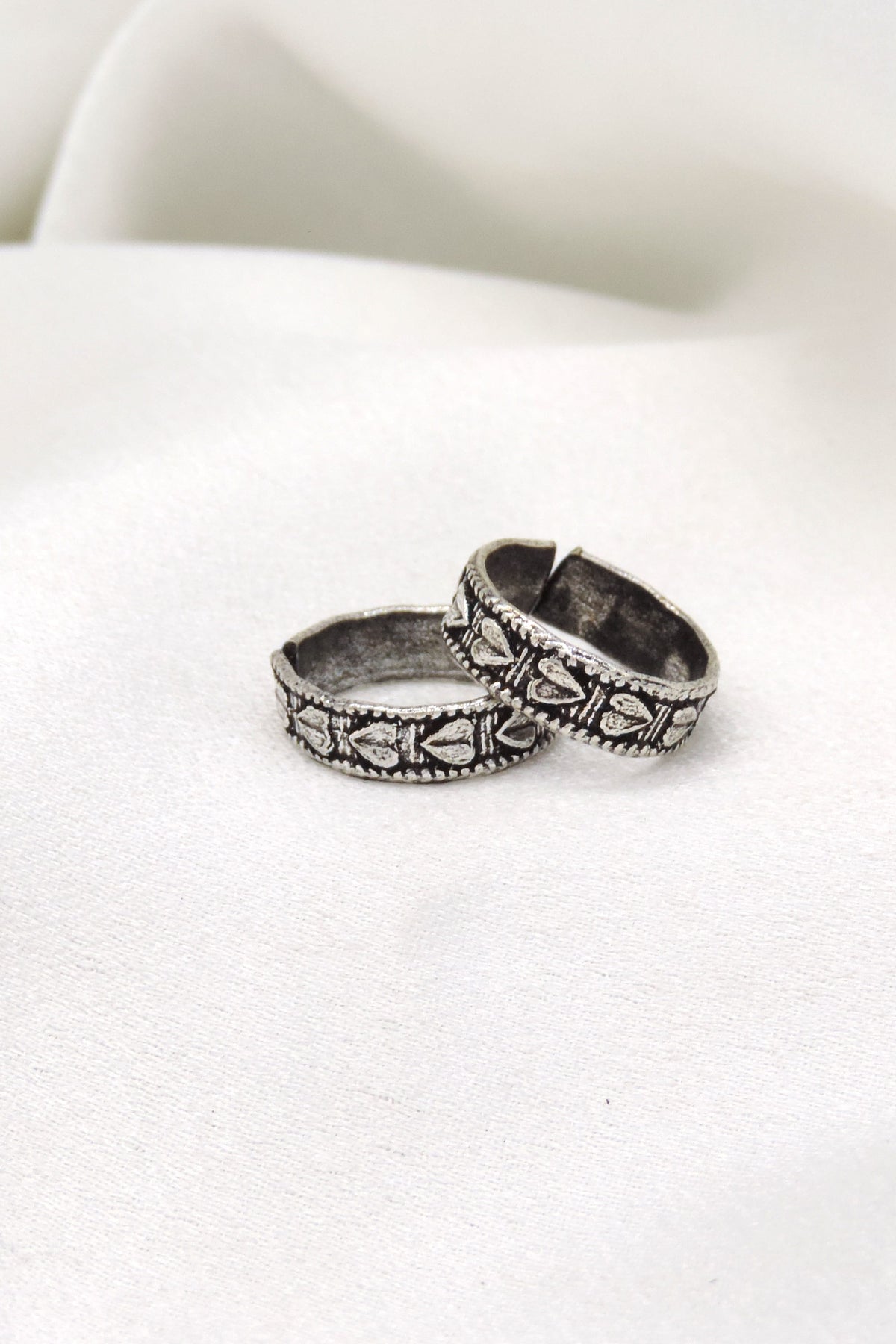 Oxidized silver patterned floral band ring with traditional detailing by joyrias