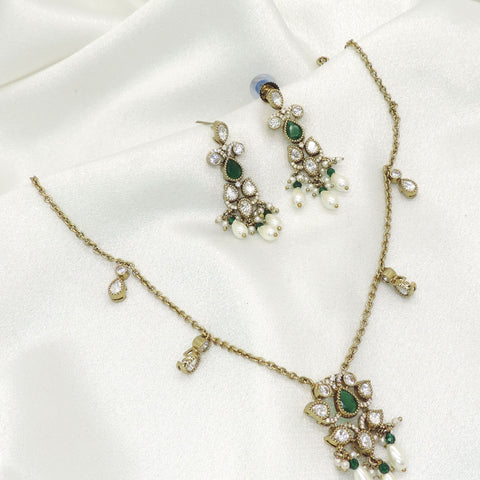 Graceful green teardrop necklace set with pearl accents and matching earrings