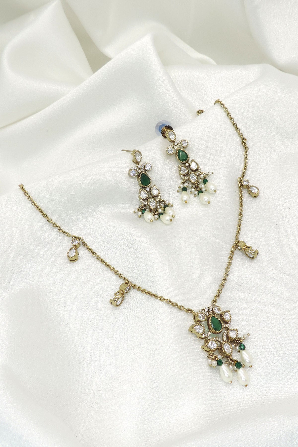 Graceful green teardrop necklace set with pearl accents and matching earrings