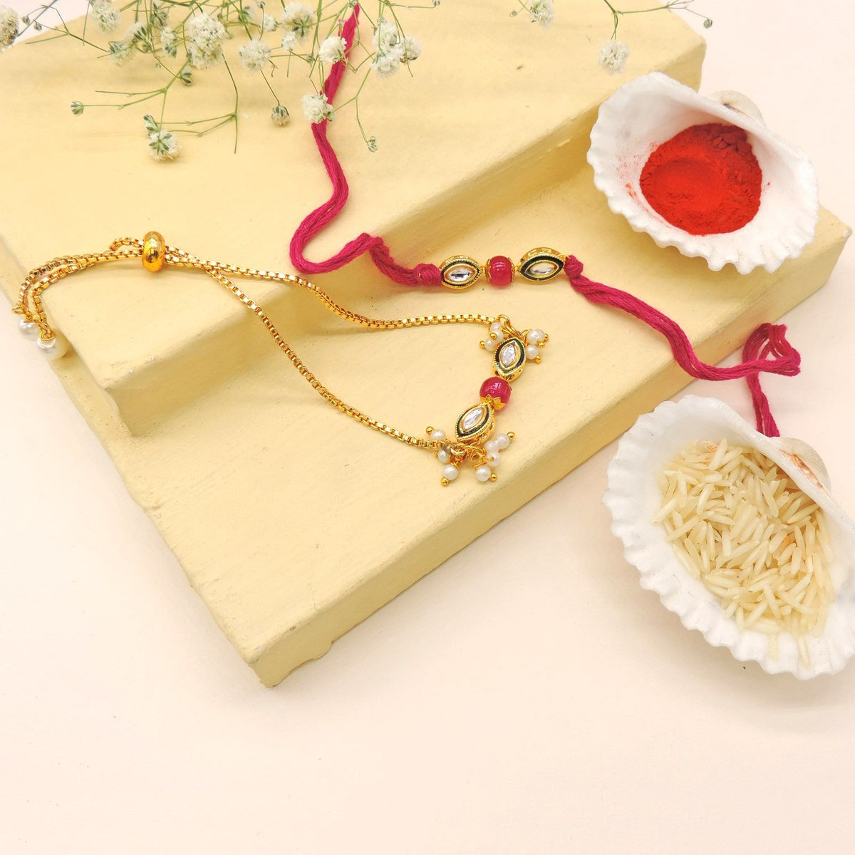 Ruby Stone Bhaiya Bhabhi Rakhi Set by Joyrias