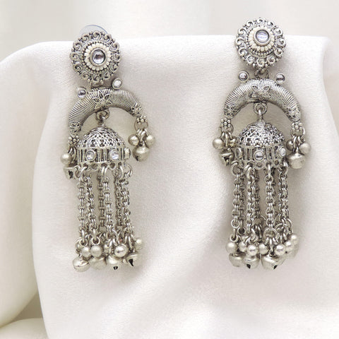Oxidized silver arched long chain jhumka earrings with traditional silver bead detailing by joyrias