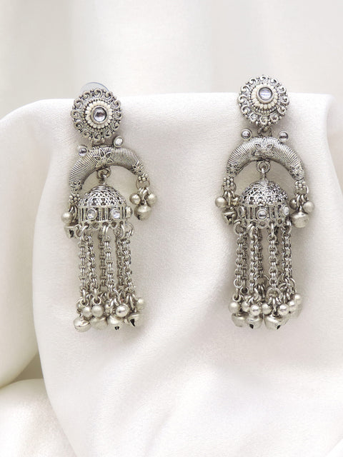Oxidized silver arched long chain jhumka earrings with traditional silver bead detailing by joyrias
