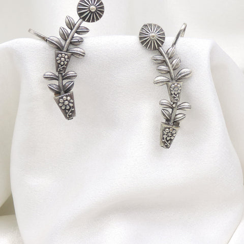 Oxidized silver floral leaf ear cuff earrings with intricate botanical detailing by joyrias