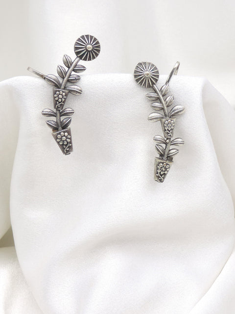 Oxidized silver floral leaf ear cuff earrings with intricate botanical detailing by joyrias