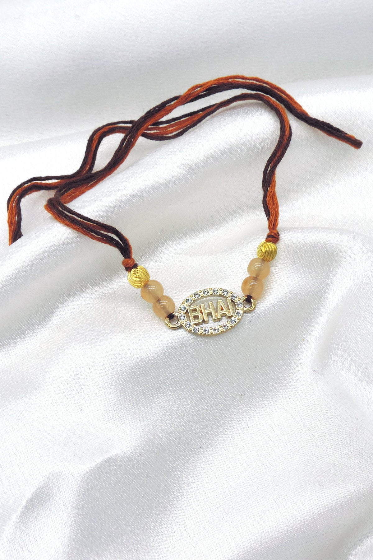Bhai CZ oval charm bhaiya rakhi by Joyrias