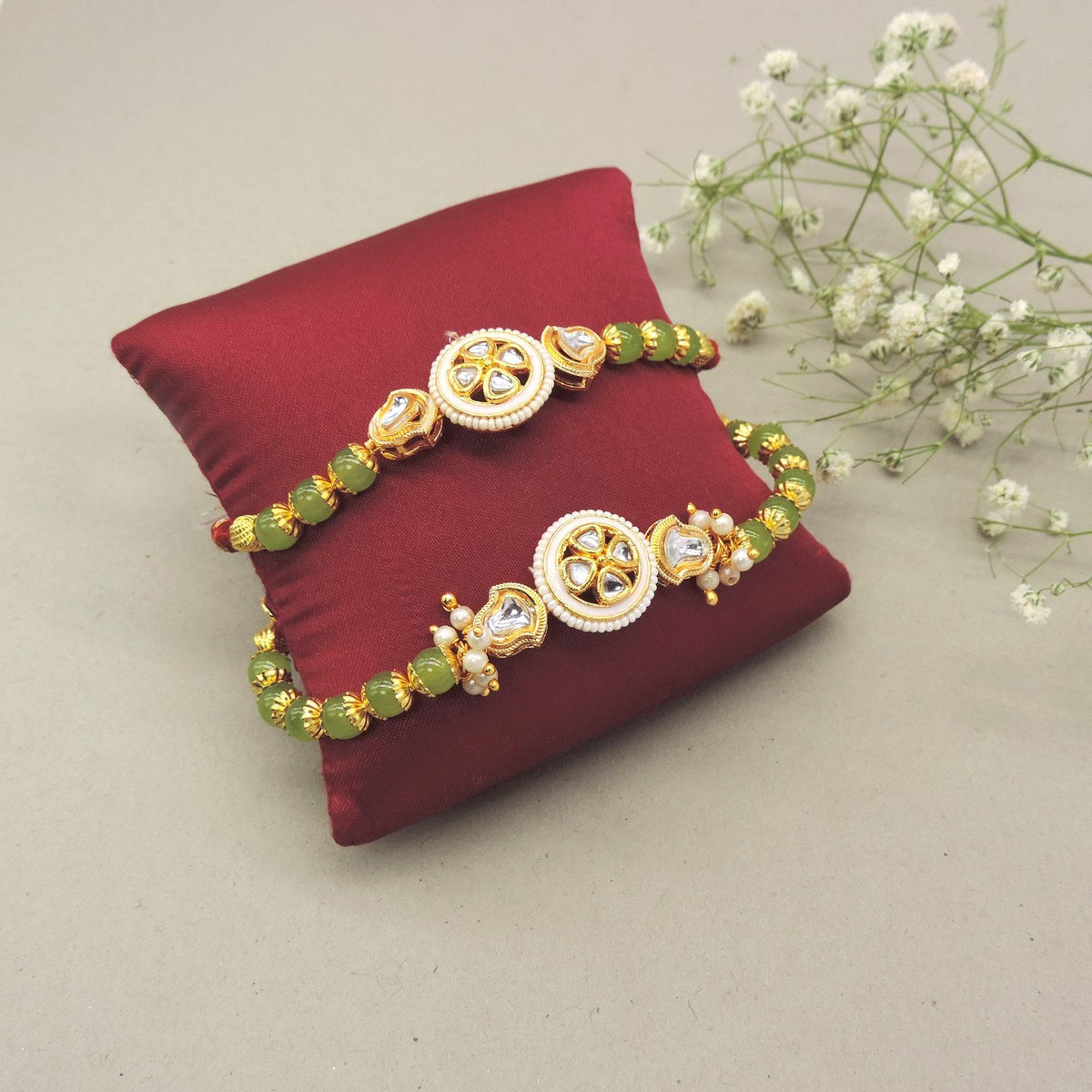 Pearl & Green Kundan Bhaiya Bhabhi Rakhi Set