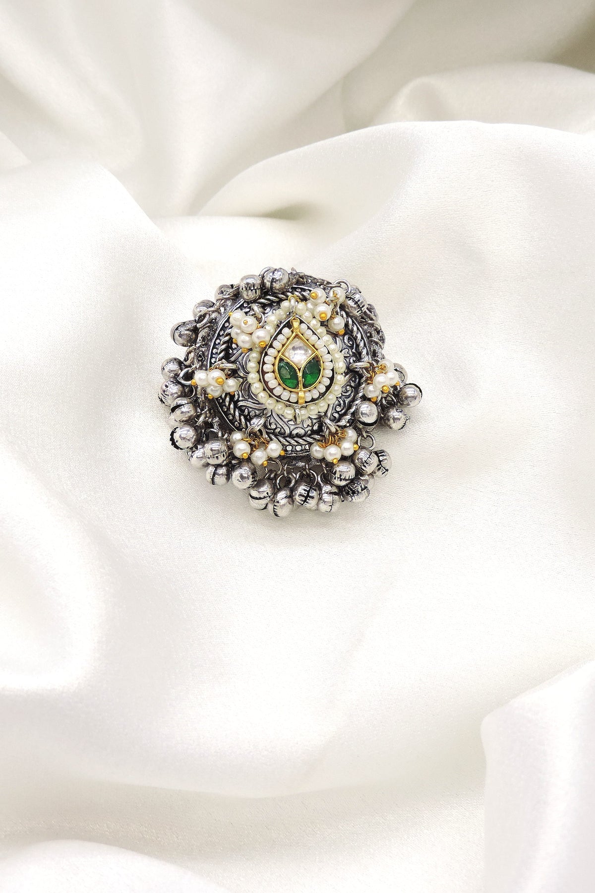 Oxidized green pearl kundan ring with intricate antique detailing from joyrias