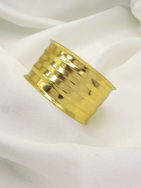 Gold layered cuff bracelet by Joyrias