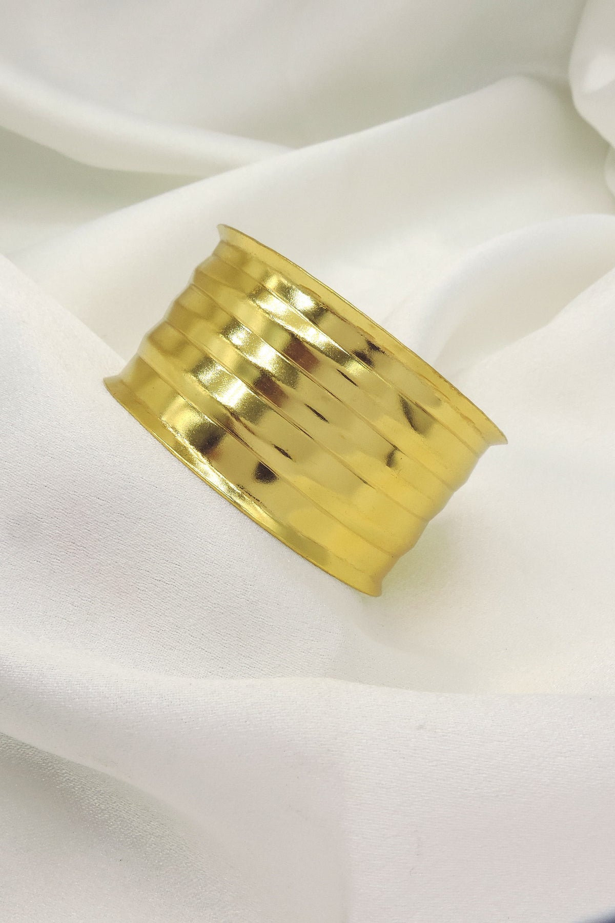 Gold layered cuff bracelet by Joyrias