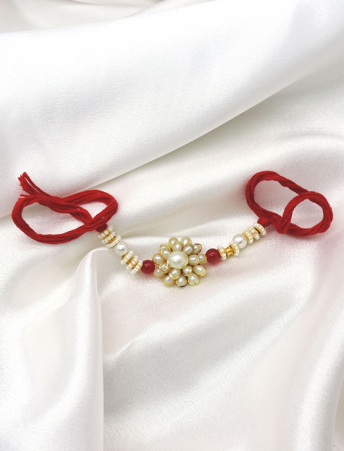 Pearl Floral Bhaiya Rakhi by Joyrias