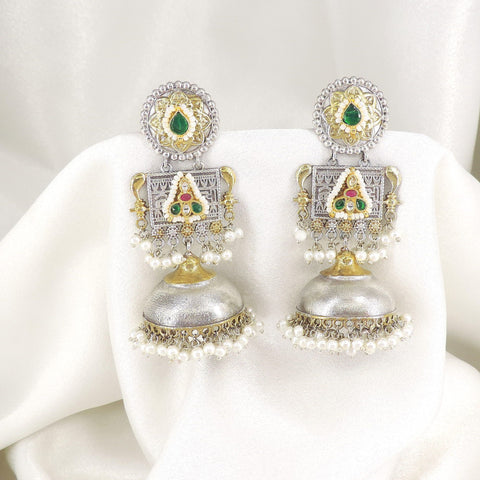 Dual-tone green red temple jhumka earrings with pearl detailing by joyrias