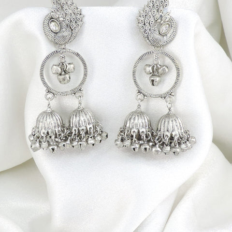 Oxidized silver peacock double jhumka earrings with intricate feather detailing by joyrias