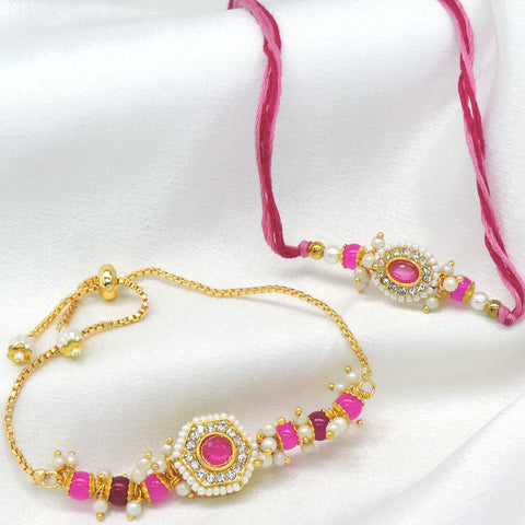 CZ halo pink bhaiya bhabhi rakhi set with seed pearl border and pearl cluster drops by Joyrias