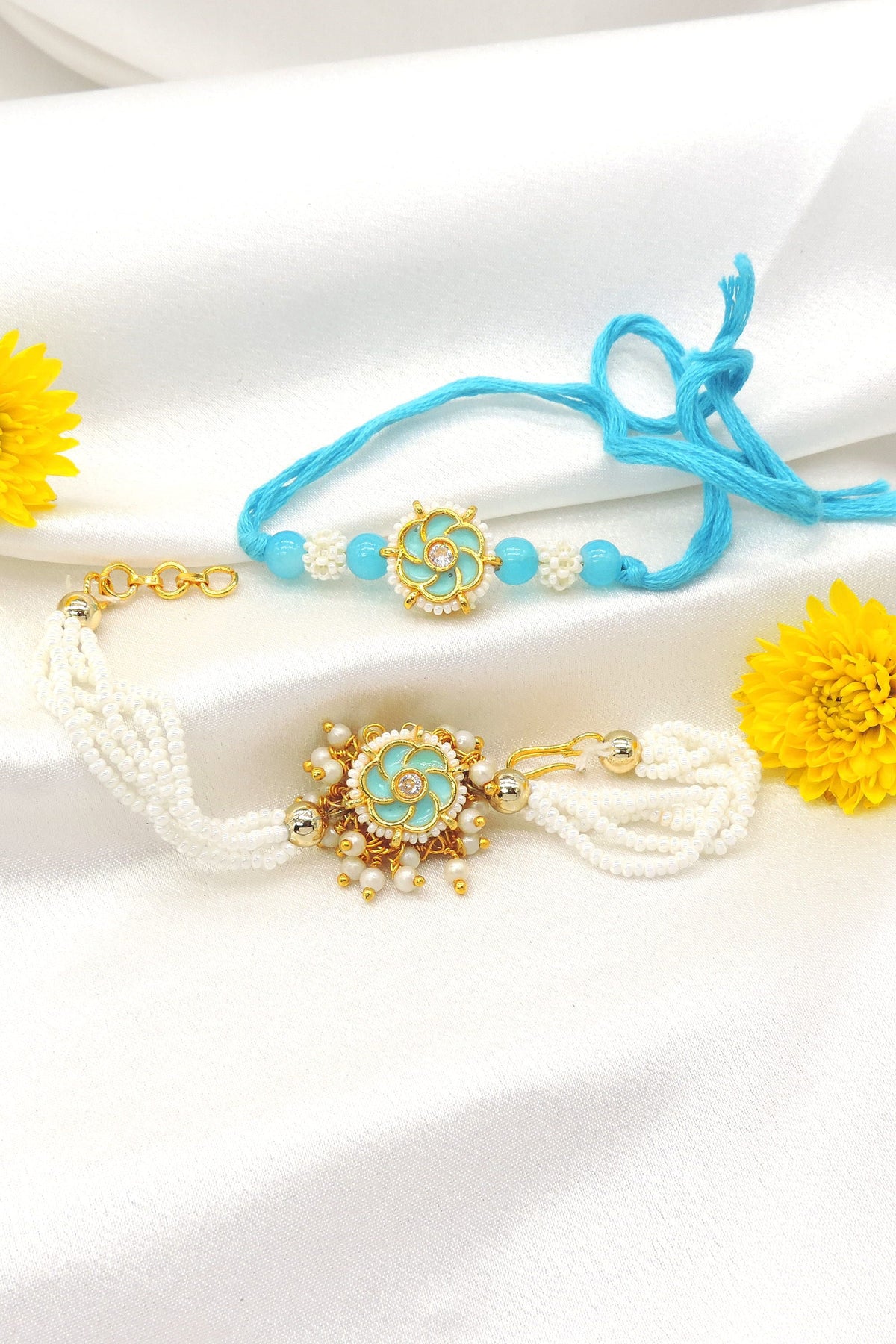 Sky blue floral enamel pearl bhaiya bhabhi rakhi set by Joyrias