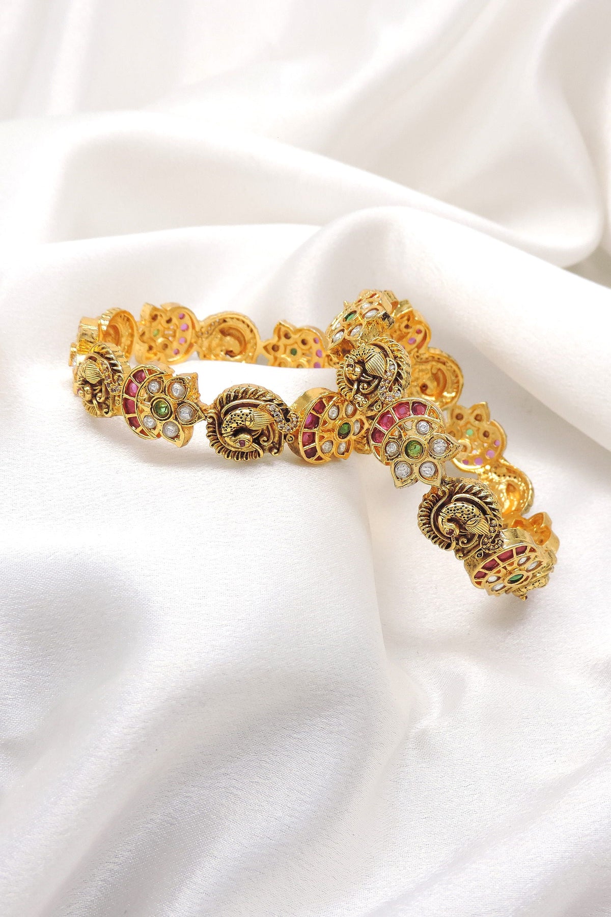 Royal Peacock Kundan Bangle Set by Joyrias