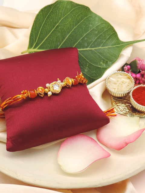 Designer Kundan Rakhi with Orange Crystal Beads