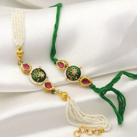 Green meenakari kundan pearl bhaiya bhabhi rakhi set by Joyrias
